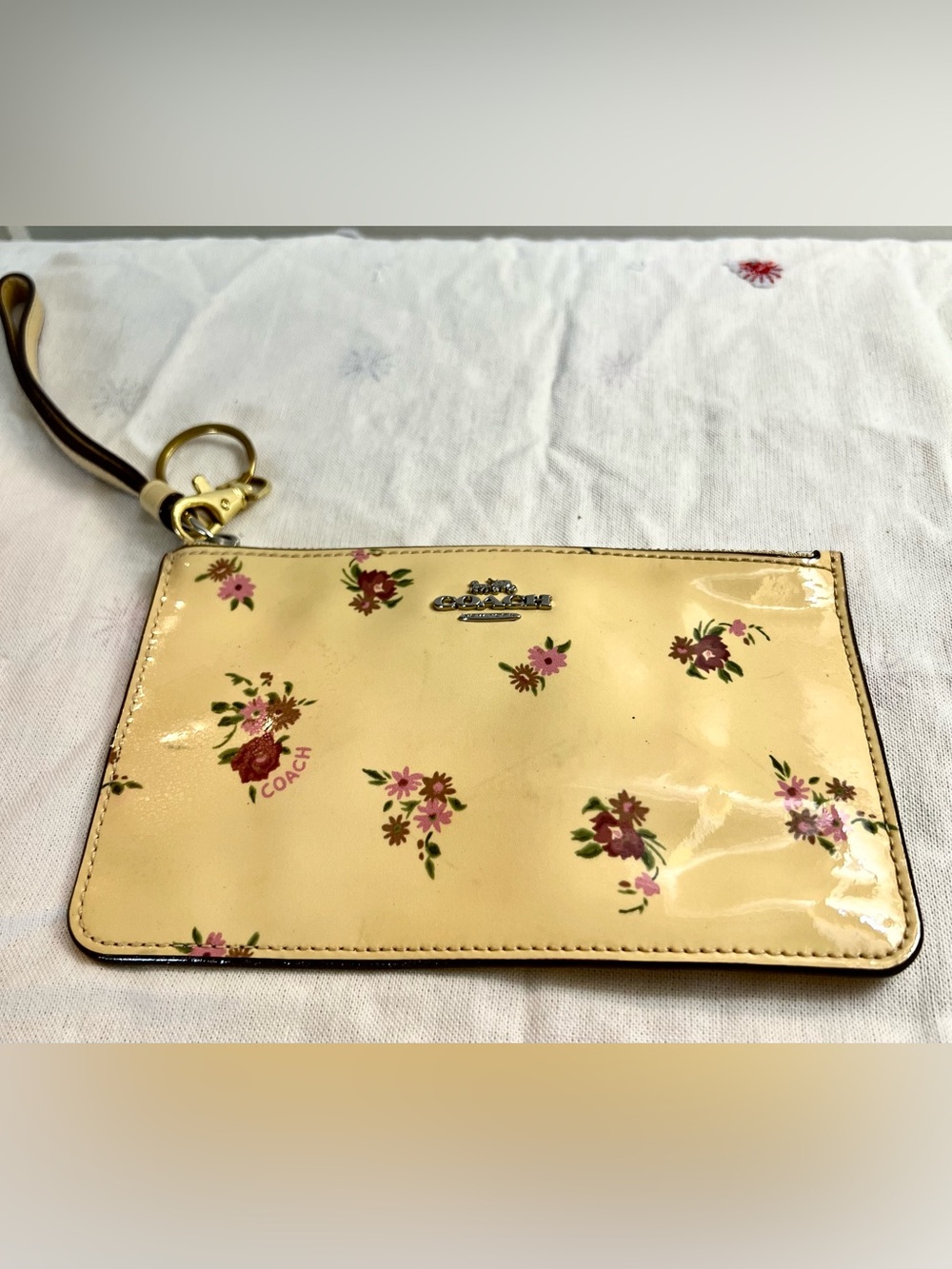 Coach Yellow Floral Patent Leather Wristlet